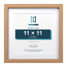 Devon Oak 14 x 14 inch picture frame with a white mount for an 11 x 11 inch photo
