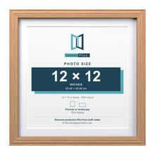 Devon Oak 14 x 14 inch picture frame with a white mount for a 12 x 12 inch photo