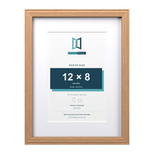 Devon Oak 16 x 12 inch picture frame with a white mount for a 12 x 8 inch photo