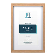 Devon Oak 18 x 12 inch picture frame with a white mount for a 14 x 8 inch photo
