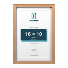 Devon Oak 18 x 12 inch picture frame with a white mount for a 16 x 10 inch photo