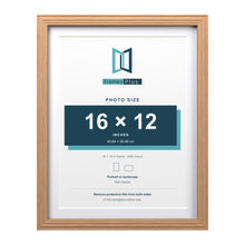 Devon Oak 18 x 14 inch picture frame with a white mount for a 16 x 12 inch photo