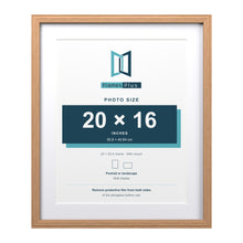 Devon Oak 24 x 20 inch picture frame with a white mount for a 20 x 16 inch photo