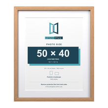 Devon Oak 60 x 50 cm picture frame with a white mount for a 50 x 40 cm photo