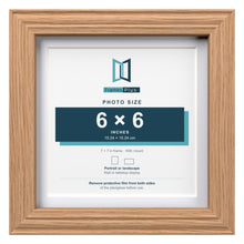 Devon Oak 7 x 7 inch picture frame with a white mount for a 6 x 6 inch photo