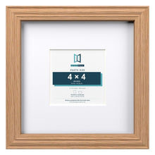 Devon Oak 8 x 8 inch picture frame with a white mount for a 4 x 4 inch photo