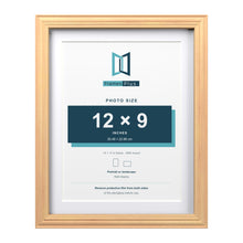 Devon Pine 14 x 11 inch picture frame with a white mount for a 12 x 9 inch photo