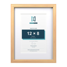 Devon Pine 16 x 12 inch picture frame with a white mount for a 12 x 8 inch photo