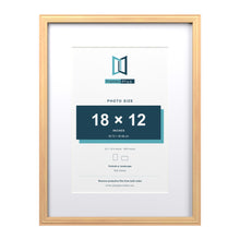 Devon Pine 24 x 18 inch picture frame with a white mount for an 18 x 12 inch photo