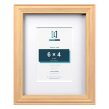 Devon Pine 9 x 7 inch picture frame with a white mount for a 6 x 4 inch photo