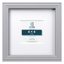 Devon Silver 8 x 8 inch picture frame with a white mount for a 4 x 4 inch photo