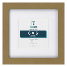 Gold 10 x 10 inch picture frame with a white mount for a 6 x 6 inch photo