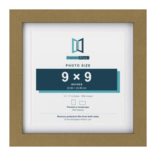 Gold 11 x 11 inch picture frame with a white mount for a 9 x 9 inch photo