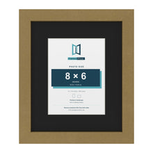 Gold 12 x 10 inch picture frame with a black mount for an 8 x 6 inch photo
