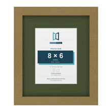 Gold 12 x 10 inch picture frame with a green mount for an 8 x 6 inch photo