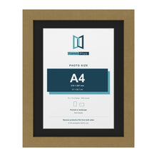 Gold 14 x 11 inch picture frame with a black mount for an A4 photo