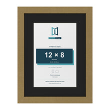 Gold 16 x 12 inch picture frame with a black mount for a 12 x 8 inch photo