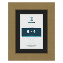 Gold 8 x 6 inch picture frame with a black mount for a 6 x 4 inch photo