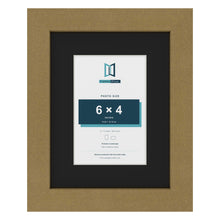 Gold 9 x 7 inch picture frame with a black mount for a 6 x 4 inch photo