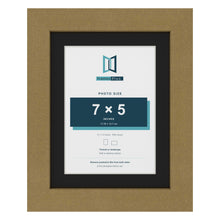 Gold 9 x 7 inch picture frame with a black mount for a 7 x 5 inch photo