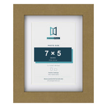 Gold 9 x 7 inch picture frame with a white mount for a 7 x 5 inch photo