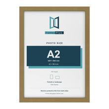 Gold picture frame for an A2 photo