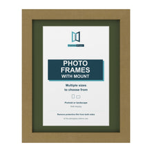 Gold picture frame with a green mount