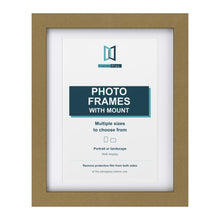 Gold picture frame with a white mount