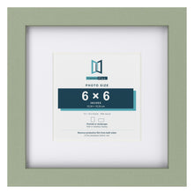 Green 10 x 10 inch picture frame with a white mount for a 6 x 6 inch photo