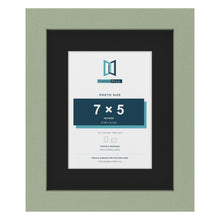 Green 10 x 8 inch picture frame with a black mount for a 7 x 5 inch photo
