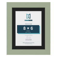 Green 10 x 8 inch picture frame with a black mount for an 8 x 6 inch photo