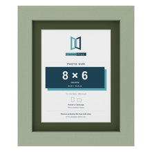 Green 10 x 8 inch picture frame with a green mount for an 8 x 6 inch photo
