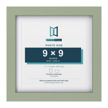 Green 11 x 11 inch picture frame with a white mount for a 9 x 9 inch photo