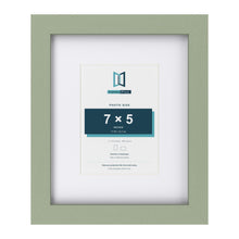 Green 11 x 9 inch picture frame with a white mount for a 7 x 5 inch photo