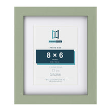 Green 11 x 9 inch picture frame with a white mount for an 8 x 6 inch photo