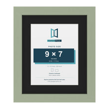 Green 12 x 10 inch picture frame with a black mount for a 9 x 7 inch photo