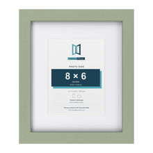 Green 12 x 10 inch picture frame with a white mount for a 8 x 6 inch photo