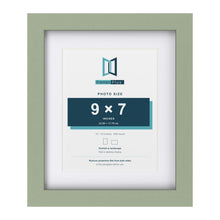 Green 12 x 10 inch picture frame with a white mount for a 9 x 7 inch photo