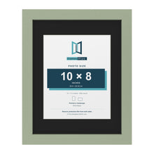 Green 14 x 11 inch picture frame with a black mount for a 10 x 8 inch photo