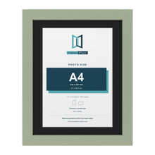 Green 14 x 11 inch picture frame with a black mount for an A4 photo