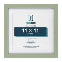 Green 14 x 14 inch picture frame with a white mount for an 11 x 11 inch photo