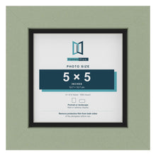 Green 6 x 6 inch picture frame with a black mount for a 5 x 5 inch photo