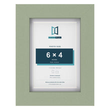 Green 7 x 5 inch picture frame with a white mount for a 6 x 4 inch photo