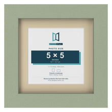 Green 7 x 7 inch picture frame with an ivory mount for a 5 x 5 inch photo