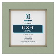 Green 7 x 7 inch picture frame with an ivory mount for a 6 x 6 inch photo