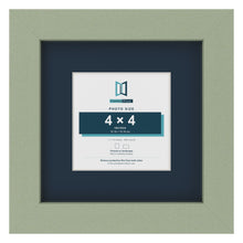 Green 7 x 7 inch picture frame with a Pacific Blue mount for a 4 x 4 inch photo