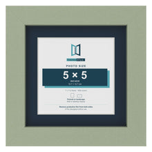 Green 7 x 7 inch picture frame with a Pacific Blue mount for a 5 x 5 inch photo