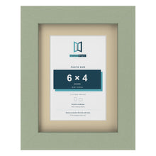 Green 8 x 6 inch picture frame with an ivory mount for a 6 x 4 inch photo