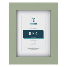 Green 8 x 6 inch picture frame with a white mount for a 6 x 4 inch photo