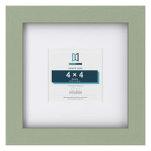 Green 8 x 8 inch picture frame with a white mount for a 4 x 4 inch photo